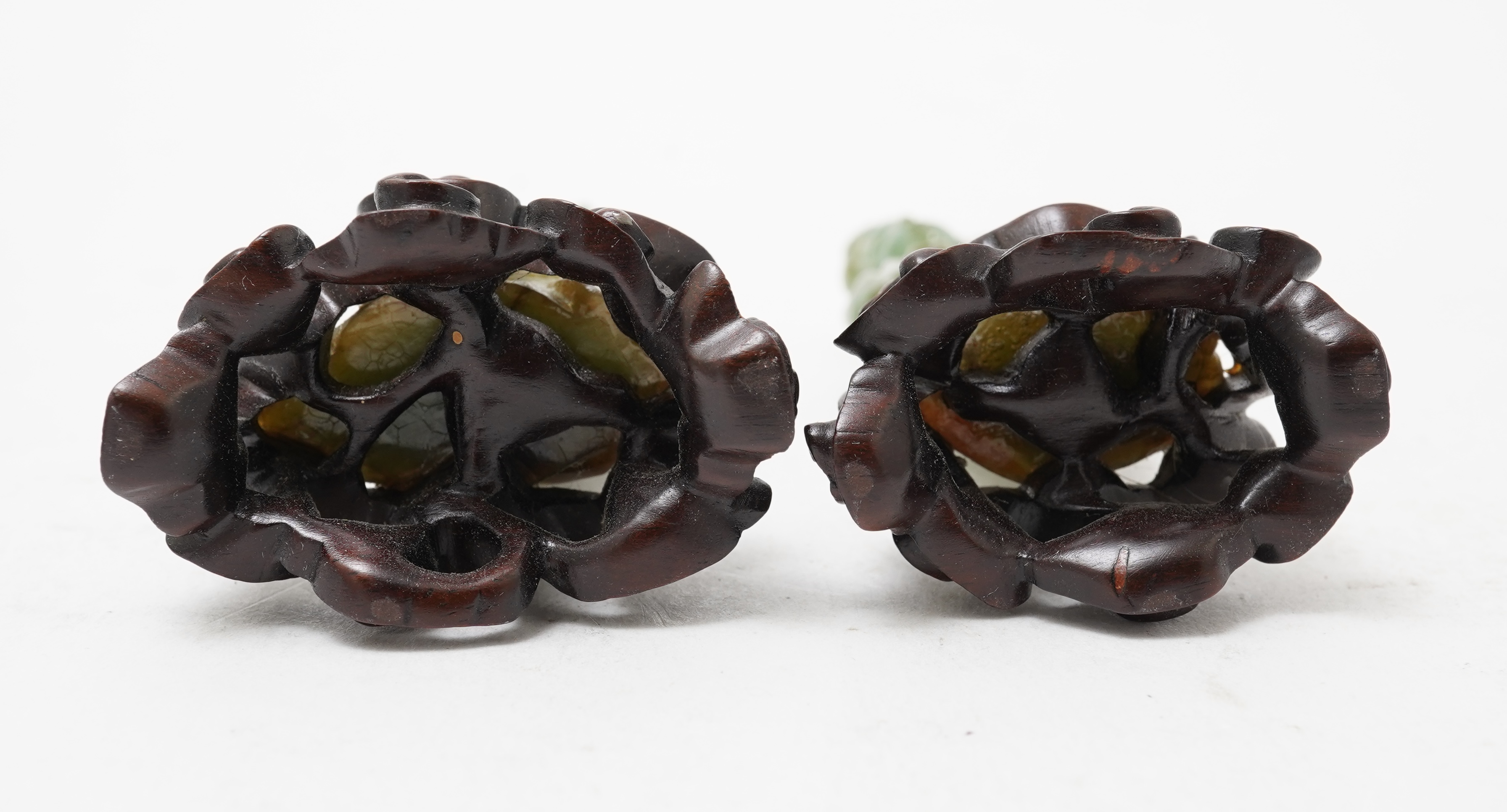 Possibly retailed by Cartier, a pair of Chinese jadeite figures, early 20th century